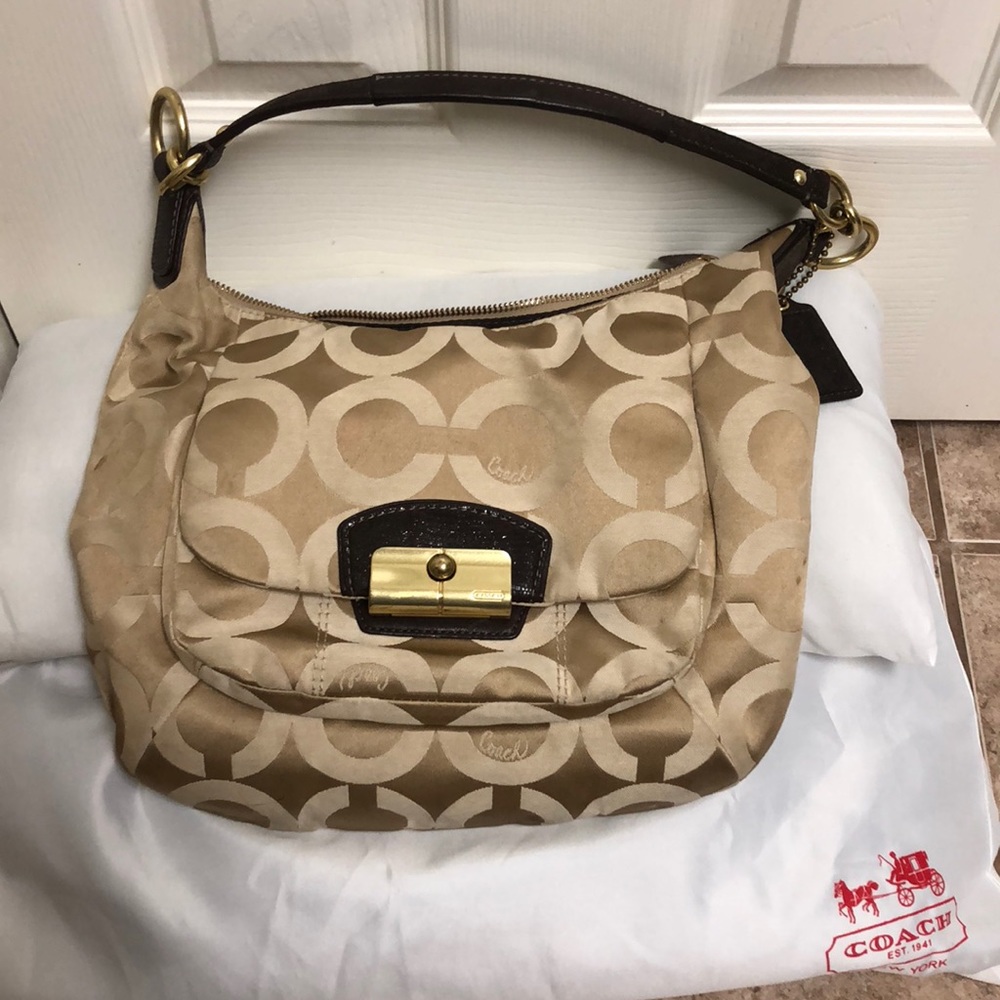 Brown and Tan C patterned Coach purse